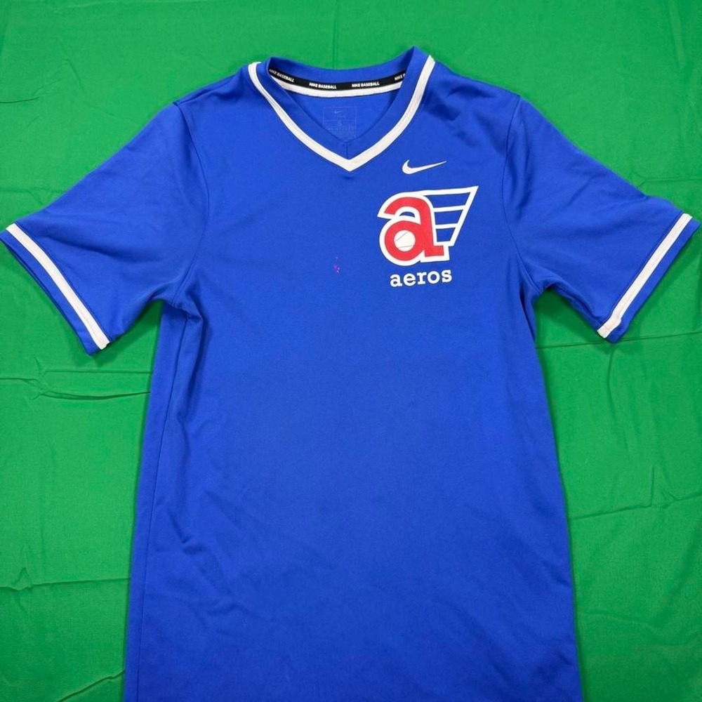 Nike Aeros blue jersey with white trim on collar and sleeves, size S